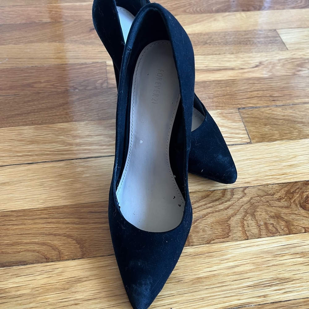 Pointed black heels